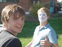 Ross happy with the result of Ed's face painting skills